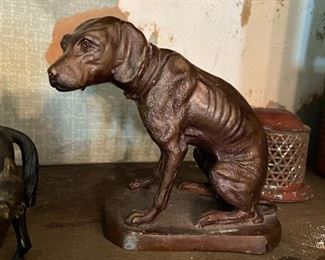 emaciated bronze dog sculpture