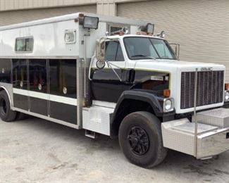 VIN 1GDP9C1J6DV534430
Year: 1983 Make: GMC Model: Brigadier Trim Level: Command Center
Engine Type: 9.0L V6 Diesel
Transmission: Automatic
Miles: 24,471 TMU
Color: Black
Driveline: 2WD
Located In: Chattanooga, TN
Operational Status: Runs and Drives
*Small Oil Leak Noted After Idle*
Manual Windows
Manual Locks
Air Spring Suspension Seat
Vinyl Interior
Motor Spec:
MFR - Detroit Diesel
Model - 80577800
Winch Spec:
Hydraulic Powered (Unable to Test)
MFR - Ramsey
Model - DC2-245R
Serial - 374037
Generator Spec:
MFR - Harrison
Hours - 1,141
Model - 15.OMPC-16B
Spec Number - 1C
Serial - D841489
120/240 Volts
15 Kva
15 Kw
62 Amps
60 Hz
Overall Size - 387"L x 97-1/4"W x 125"H
(8) Quad 110V Outlets
(6) Standard 110V Outlets
Frigidaire Wall A/C Unit
Unmarked Floor Heater
(10) Overhead Compartments
(8) Wall Compartments
Intercom System
Under Bench Storage w/ Stretchers & Barricade
Black & Decker Mini Fridge
(2) Electric Extension Cord Reels
(1) Electric Air Hose Reel
Exterior Spot Lights
**Sold on