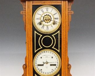 Waterbury No. 44 Calendar Shelf Clock - A 19th century Waterbury "No. 44" model calendar shelf clock.  8-day time, strike and alarm movement with painted metal dials, Roman numerals on time dial and Arabic on the calendar dial.  Walnut case with incised carving and shaped crest over a single long door with reverse painted glass on a molded base.  Paper labels on back 70% intact.  Older refinishing with minor wear, craquelure and minor losses to dials, rollers quite dark, running when cataloged.  24" high.  ESTIMATE $300-400
