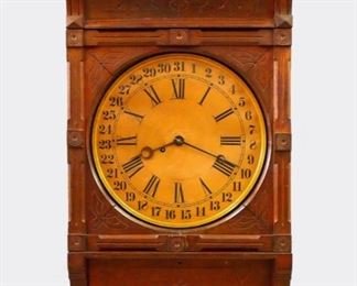 Kroeber Cabinet Gallery Model Wall Clock - A late 19th century Kroeber "Cabinet Gallery" model wall clock.  8-day time only movement with papered metal dial and Roman numerals.  Walnut case with turned upper rail over a single door with carved detail and shaped drop with access door.  Older muddy re-finishing with wear and shrinkage, replaced paper (calendar) dial, lacks lower door knob, running when cataloged.  34 1/2" high.  ESTIMATE $300-500
