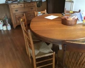 Oak pedestal table with apron