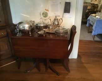 Smaller drop leaf dining table with four chairs . Duncan Phyfe style