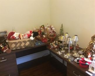 Christmas collectibles all located in school house. There are decorations for tree, lights, and linens 