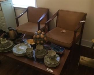 Mid century modern chairs and dishes located in school house