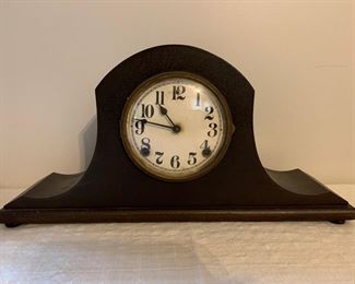 Working mantle clock with hourly chime.