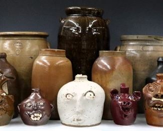 Stoneware crocks and jugs, including face jugs. Picture #A.65