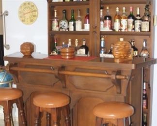 Vintage bar with 3 stools, shelves and separate  bar counter. Large bottle collection for sale too.