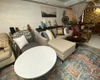Sofas, coffee tables, credenzas, and chairs