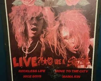 GnR venue poster signed by Slash and Duff.