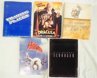 1018 LOT OF FIVE MOVIE PRESS KITS. LOT INCLUDES TRADING PLACES; CONTAINS 18 STILLS INCLUDING ONE SIGNED, PRODUCTION INFO & A SCREENING INVITATION, HISTORY OF THE WORLD PART I; CONTAINS 17 STILLS & PRODUCTION INFO, DRACULA DEAD & LOVING IT; CONTAINS 9 STILLS PRODUCTION INFO & A SCREENING INVITATION, AIRPLANE! CONTAINS 12 STILLS, PRODUCTION INFO & SCREENING INVITATION & SCROOGED; CONTAINS 13 STILLS & PRODUCTION INFO.