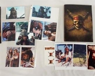 1028 LOT OF PIRATES OF THE CARRIBEAN MOVIE MEMORBILIA. LOT INCLUDES TWO PRESS KITS FOR THE CURSE OF THE BLACK PEARL, SIGNED PRINTS ETC.