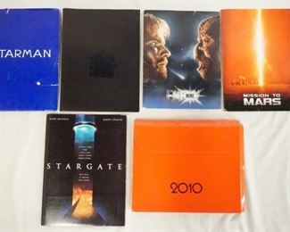 1030 LOT OF SIX SCI-FCI MOVIE PRESS KITS. LOT INCLUDES, MISSION TO MARS, ENEMY MINE, THE ISLAND OF DR. MOREAU, STARGATE, STARMAN, & 2010. KITS CONTAIN STILLS, PRODUCTION NOTES ETC.