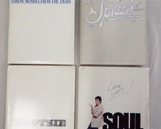 1032 LOT OF FOUR MOVIE PRESS KITS. LOT INCLUDES, SPLASH; CONTAINS 14 STILLS & PRODUCTION INFO. SOUL MAN; CONTAINS 11 STILLS, PRODUCTION INFO & A SCREENING INVITATION. TOOTSIE; CONTAINS 15 STILLS & PRODUCTION INFO. & THROW MAMMA FROM THE TRAIN; CONTAINS 16 STILLS INCLUDING ONE SIGNED, PRODUCTION INFO, & 20 35 MM SLIDES.