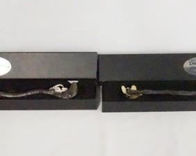 1053 LOT OF TWO HARRY POTTER THE NOBLE COLLECTION DEATH EATER WAND REPLICAS. LOT INCLUDES DEATHER EATER (SNAKE) & DEATH EATER (SKUL). BOX COME W/ ORIGINAL BOXES.