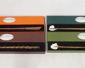 1065 LOT OF FOUR HARRY POTTER THE NOBLE COLLECTION WANT REPLICAS. LOT INCLUDES, NYMPHADORA TONKS, PERCY WEASLEY, XENOPHILIUS LOVEGOOD, & PROFESSOR FILIU FLITWICK. ALL COME W/ ORIGINAL BOXES.