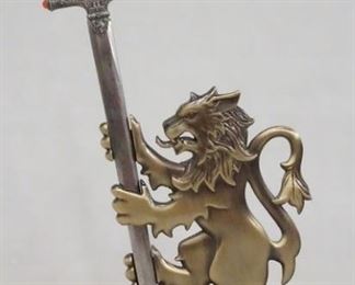 1098 HARRY POTTER THE NOBLE COLLECTION SWORD LETTER OPENER W/ GRYFFINDOR STAND. APP. 9 1/4 IN H INCLUDING LETTER OPENER.