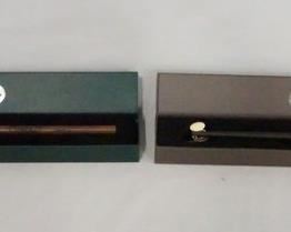 1124 LOT OF TWO THE NOBLE COLLECTION HARRY POTTER WAND REPLICAS, LOT INCLUDES JAMES POTTER & DEAN THOMAS W/ ORIGINAL BOXES.
