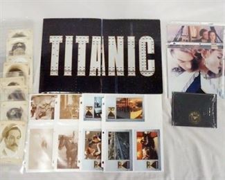 1132 LOT OF MOVIE MEMORABILIA FROM TITANIC. LOT INCLUDES PRINTS, POSTCARDS, ETC. & A PRESS KIT FOR THE 1997 FILM THAT CONTAINS PRODUCTION INFO & 13 STILLS.