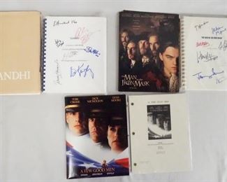 1145 LOT OF THREE MOVIE PRESS KITS W/ SCRIPTS TWO OF WHICH ARE SIGNED. LOT INCLUDES GAHNDI W/ SIGNED SCRIPT, THE MAN IN THE IRON MASK W/ SIGNED SCRIPT & A FEW GOOD MEN W/ SCRIPT & 2 SIGNED PRINTS.