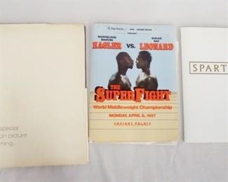 1148 LOT OF THREE MOVIE PRESS KITS INCLUDING GUESS WHO'S COMING TO DINNER (1967); CONTAINS 12 14 IN X 11 IN PRINTS & PRODUCTION INFO. SPARTACUS (FOR 1991 RE RELEASE); CONTAINS 5 STILLS & PRODUCTION INFO, & HAGLER VS LEONARD THE SUPER FIGHT 1987; CONTAINS A STILL, INFORMATION & A PROGRAM MAGAZINE