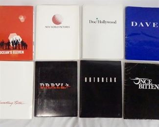 1153 LOT OF EIGHT MOVIE PRESS KITS INCLUDING OCEAN'S 11; CONTAINS 6 STILLS, A SIGNED PRINT & PRODUCTION INFO. EDUCATING RITA; CONTAINS 9 STILLS, A SCREENING INVITE & PRODUCTION INFO. D.A.R.Y.L.; CONTAINS 15 STILLS, A SCREENING INVITE & PRODUCTION INFO. OUTBREAK; CONTAINS 18 STILLS, A SCREENING INVITE & PRODUCTION INFO. ONCE BITTEN; CONTAINS 12 STILLS & PRODUCTION INFO. FLOWERS IN THE ATTIC; CONTAINS 7 STILLS & PRODUCTION INFO. DOC HOLLYWOOD; CONTAINS 3 STILLS & PRODUCTION INFO. & DAVE; CONTAINS 13 STILLS, 2 35MM SLIDES & PRODUCTION INFO.