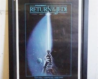 1160 STAR WARS 1983 RETURN OF THE JEDI FRAMED MOVIE POSTER. POSTER ALONE IS 22 IN X 34 IN. FRAME IS 27 IN X 39 IN.