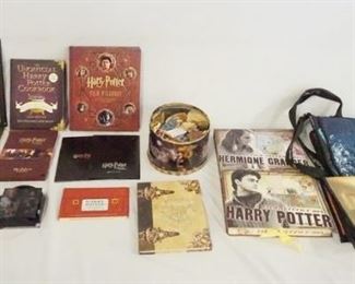 1179 LOT OF MISC. HARRY POTTER COLLECTABLES INCLUDING A FILM WIZARDY BOOK W/ EXTRAS INSIDE, THE UNOFFICAL HARRY POTTER COOK BOOK, HARRY POTTER SCHOOL BOOK REPLICAS, PLAYING CARDS AND MORE!