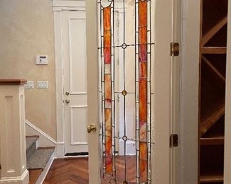 tall narrow stain glass door in the next 4 photos (7’ 10” tall by 28” wide)