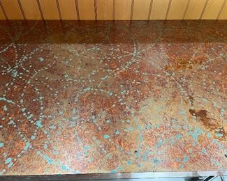 Some type of tin or copper distressed counters