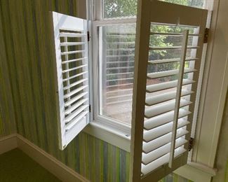several sets of plantation shutters 32” wide by 31” tall
