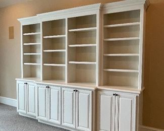 oversized shelves and cabinets 10’ wide, 22” deep, 8’2” tall