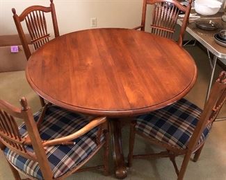 Ethan Allen table with four chairs and one leaf (leaf not shown). Note: one chair with a broken (fixable) arm.
