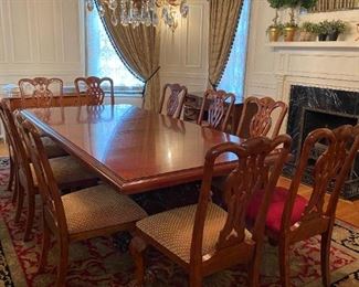 Henredon Dining Room Table with 10 Maitland Smith chairs. 