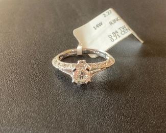 Lot #003---14kw Diamond Ring, center stone weight: 0.71ct, total diamond weight: 0.84ct, price: $1,950
