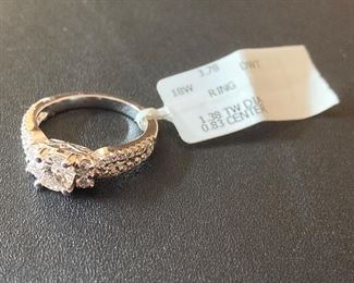 Lot #016---18kw Diamond Ring, center stone: 0.83ct, total diamond weight: 1.38ct, price: $1,250