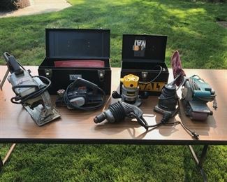 Skill saw, door planner and jig, electric drill, DeWalt router, porta cable palm sander, Mikita belt sander