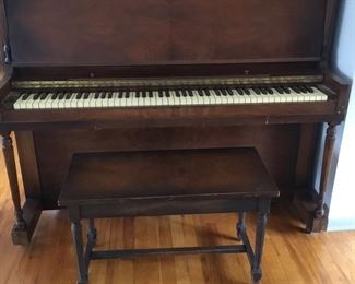 Huntington stand up piano. Need tuning.  Includes sheet music.  FREE