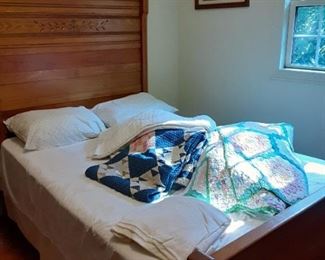 Vintage bed with antique quilts