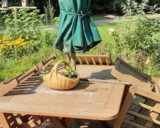 Table, four chairs and umbrella