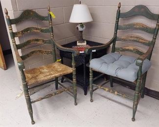 Green painted rush bottom chairs, Wicker table and table lamp
