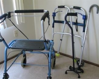 #17 $25.00 - 4 wheel rollator, walker and 1 canes
