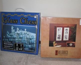 #21 $20.00 - Game lot glass chess set and dart board