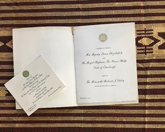 An invite to attend a party for her Majesty Queen Elizabeth II & his Royal Highness, the Prince of Philip, Duke of Edinburgh. Dated July 6th, 1959 at the Conrad Hilton on Michigan Ave in Chicago. Menu and guests inside of invitation. (2 of 2)