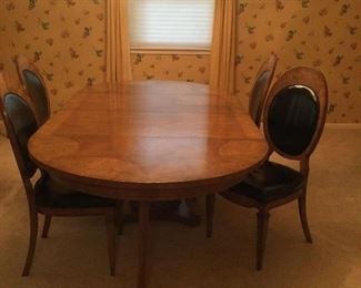 Matercraft burl and brass dining table.  4 straight chairs in burl and black leather.  