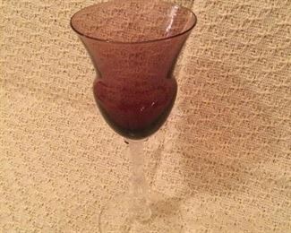 Cambridge glass.  Amethyst.  Stemmed cordial.  There are 9. 