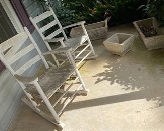 Nice old outdoor planters and rocking chairs