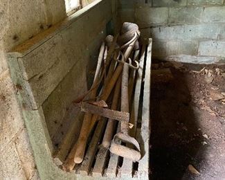 Old green bench, and garden tools