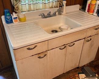 Double drain board kitchen sink and cabinet