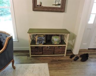 Storage unit with wicker baskets