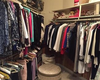 Closets full of beautiful ladies clothing, shoes, purses, belts and more. 